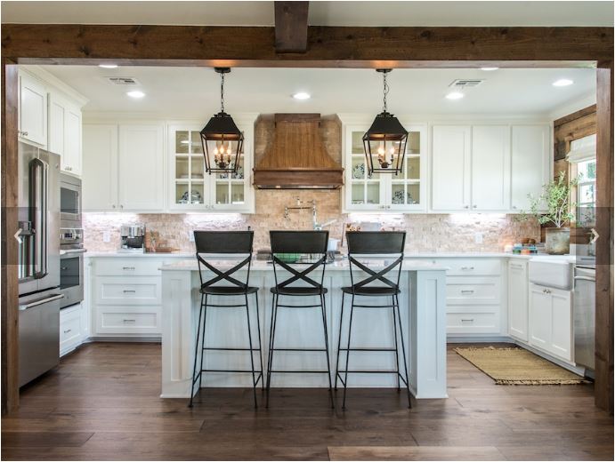 Rustic Modern Kitchen with Beamed Ceiling and Pendant Lights www.pattersondecoratinggroup.com/blog