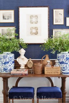 Navy Blue Rooms Entry with Blue and White Vases and Console Table www.pattersondecoratinggroup.com/blog