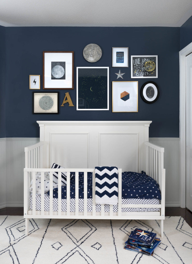 Baby Boy's bedroom with navy walls and white wainscott Blue Rooms www.PattersonDecoratingGroup.com/blog