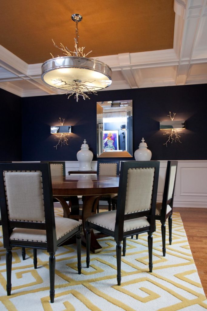 Dramatic Dark Blue Dining Room with gold accents and unique light blue rooms www.pattersondecoratinggroup.com/blog