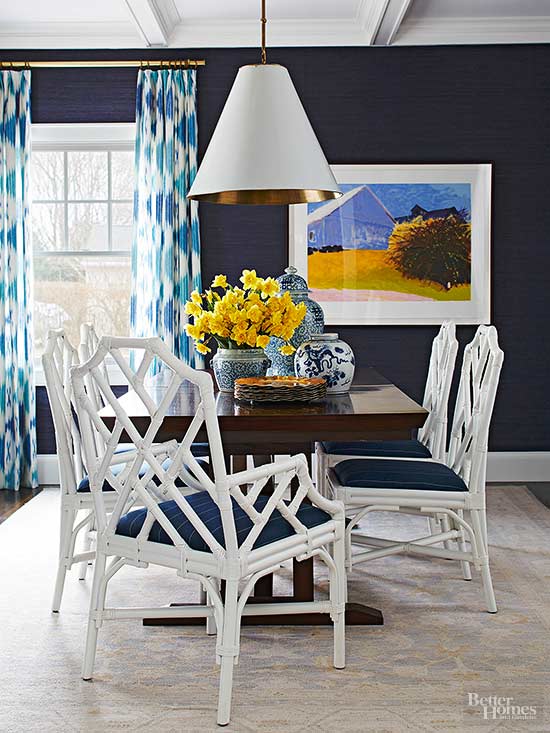 Dining room with Navy Grass cloth chippendale chairs and unique pendant light blue rooms www.pattersondecoratinggroup.com/blog