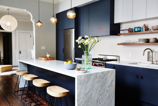 Modern Navy Kitchen with Marble Waterfall Counter www.PattersonDecoratingGroup.com/blog