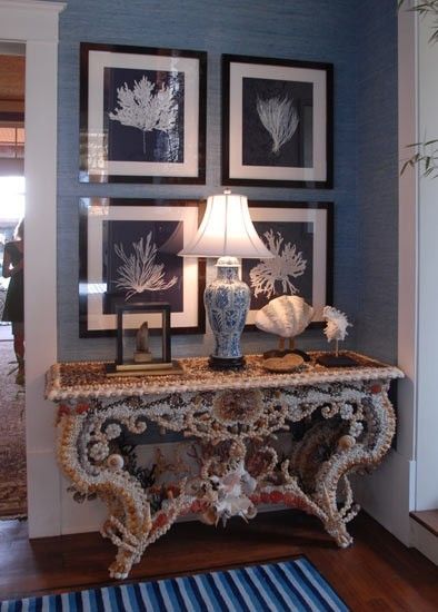 Blue Walls with Coral Art and Shell Console Blue Rooms www.PattersonDecoratingGroup.com/blog