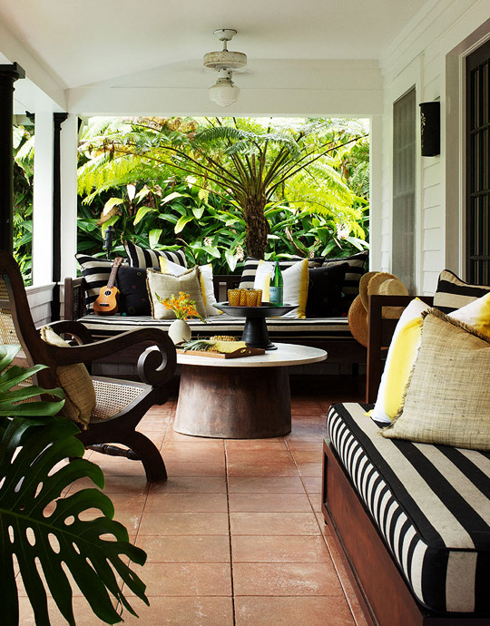 Exotic Hawaiian outdoor room with black and white cushions that we just love www.PattersonDecoratingGroup.com/blog