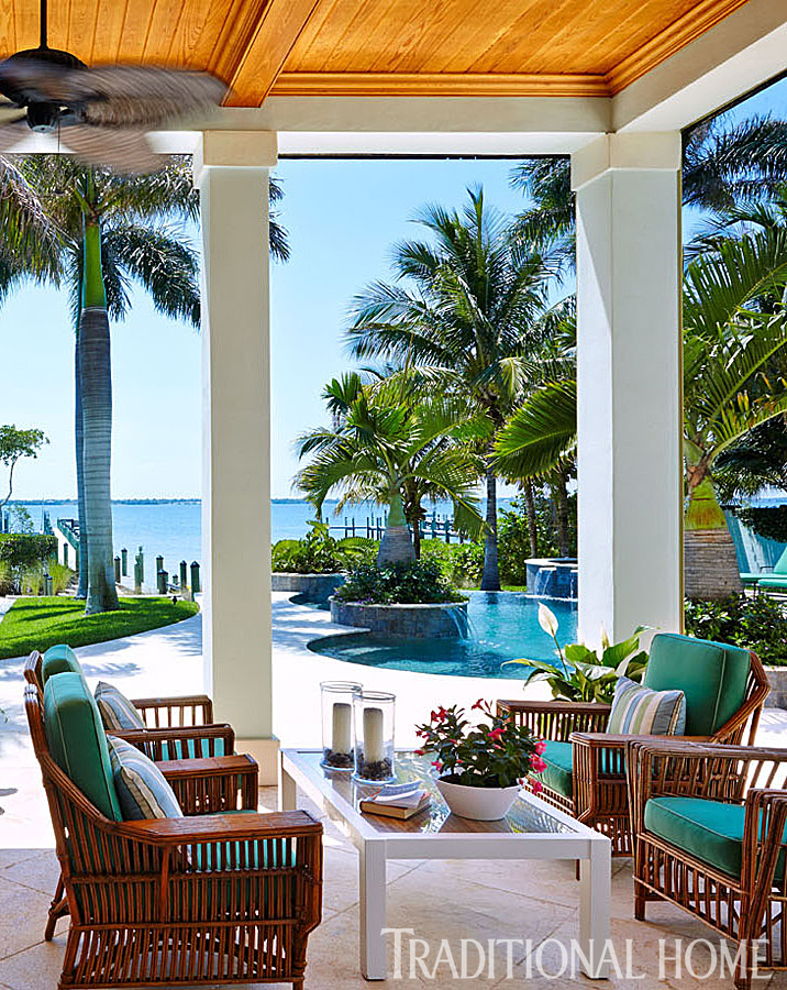 Florida home with a shaded patio area to relax in after a dip in the pool www.PattersonDecoratingGroup.com/blog