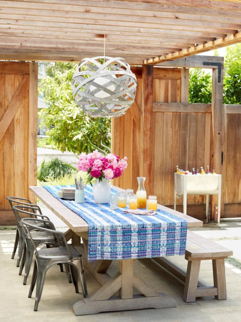Backyard dining area with Restoration Hardware farm table www.PattersonDecoratingGroup.com/blog