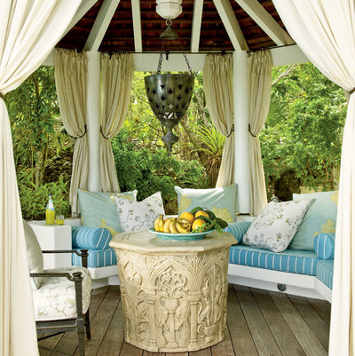 St. Barts island gazebo with outdoor curtains that make the space feel cool and inviting www.PattersonDecoratingGroup.com/blog