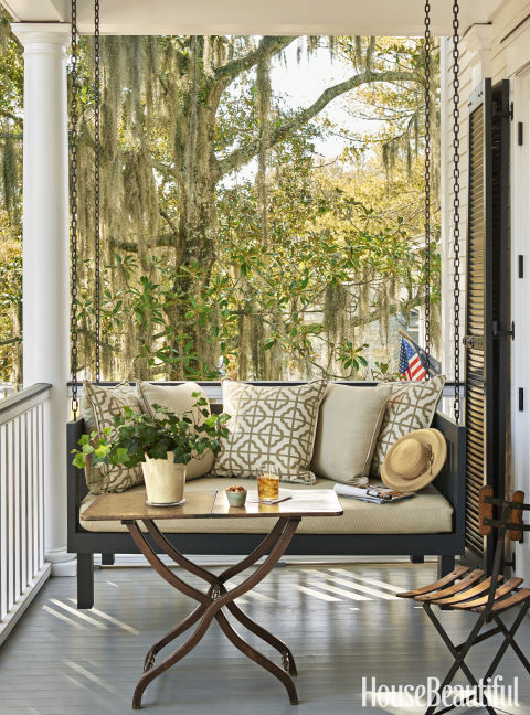 Southern Home with a hanging daybed www.PattersonDecoratingGroup.com/blog