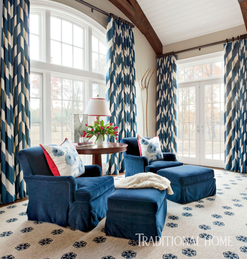 Chevron fabric energizes and warms up the windows in this comfy family room by Tobi Fairley www.PattersonDecoratingGroup.com/blog