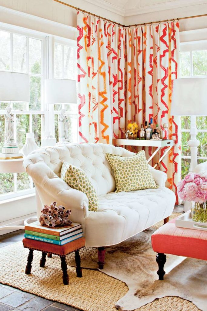 Sunroom with bold, pretty, tailored, and energetic drapery by Lindsey Ellis Beatty www.PattersonDecoratingGroup.com/blog