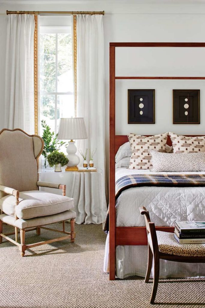 White Drapery with pretty decorative trim on the inside edges www.PattersonDecoratingGroup.com/blog