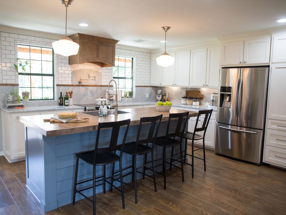 The Prickly Pear House from Fixer Upper features stone countertops, subway tile and schoolhouse pendant lights www.PattersonDecoratingGroup.com/blog