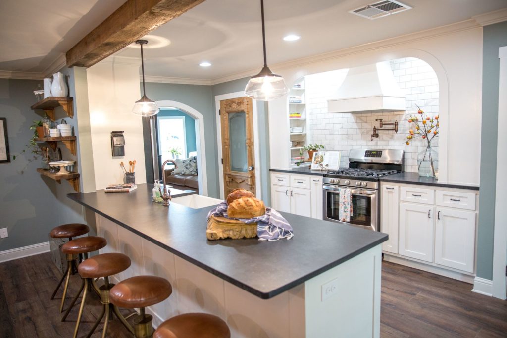 Antique doors found in Mexia make this Mexia Manor Fixer Upper kitchen unique www.PattersonDecoratingGroup.com/blog